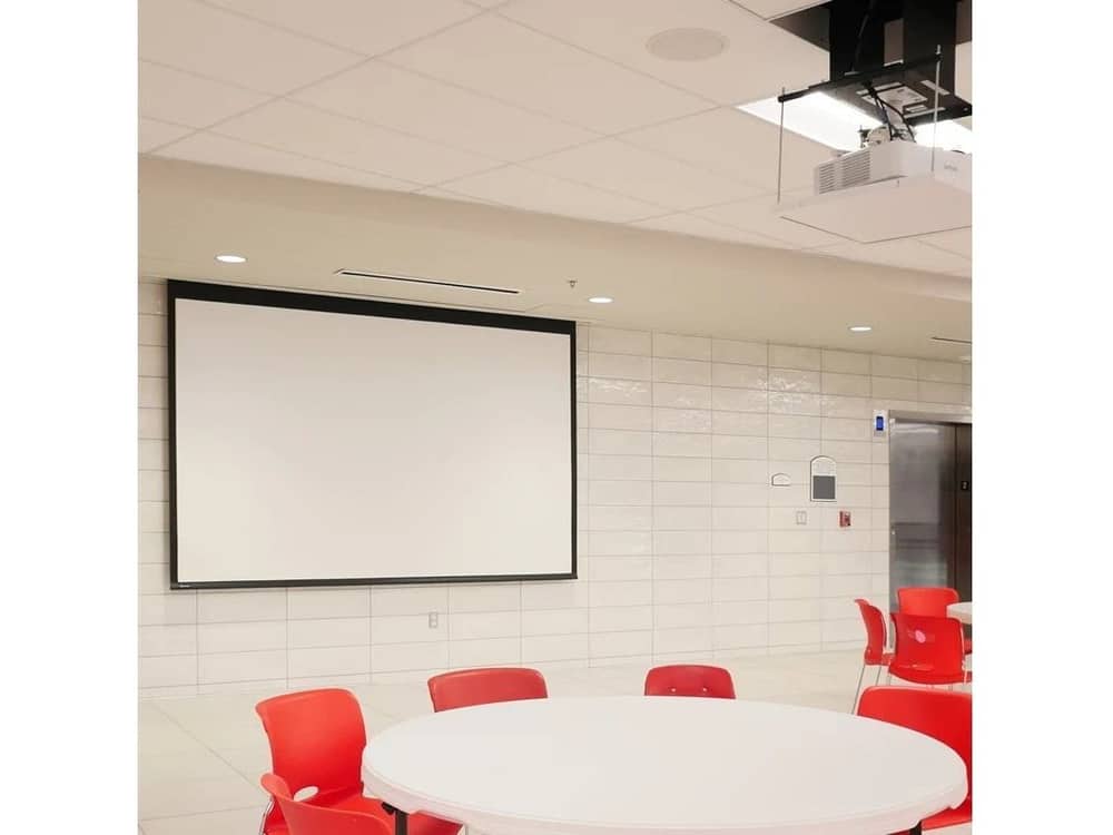 Draper Access E projection screen installed in a breakout room